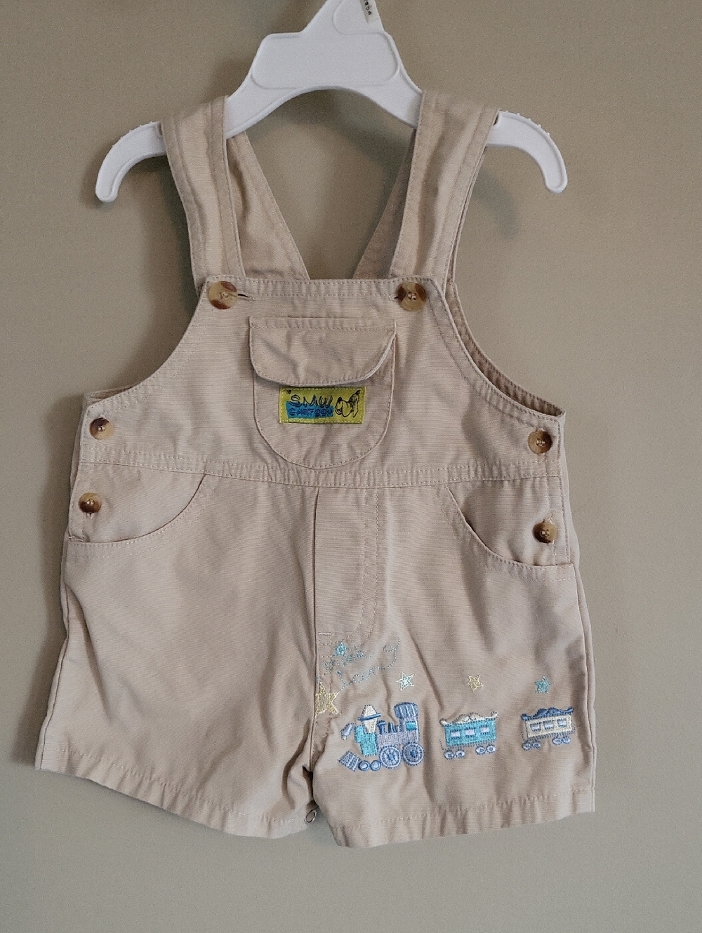 Beige embroidered train shortalls